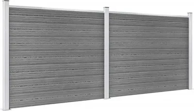 A product shot of two grey WPC fence elements side-by-side, supported by white posts.