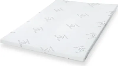 A white mattress topper with a subtle pattern is shown on a white background.