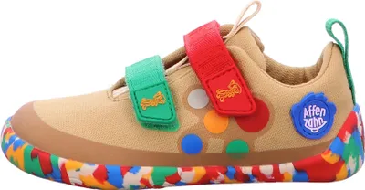 A side view of a single children's shoe.