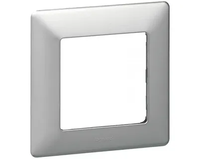 A single silver-colored wall plate with a square opening in the center, shown against a white background.
