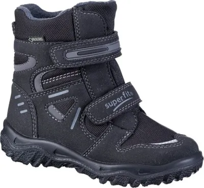 A single black winter boot for children.