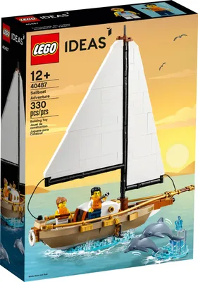 The box art for a LEGO sailboat adventure set, showing the assembled model on the water with dolphins and two minifigures.