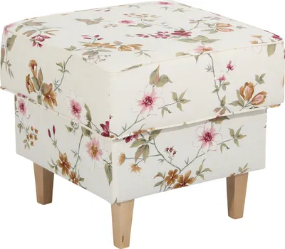 A floral-patterned ottoman with four wooden legs.