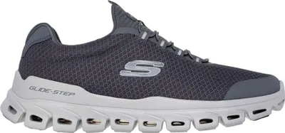A side view of a single gray Skechers sneaker.