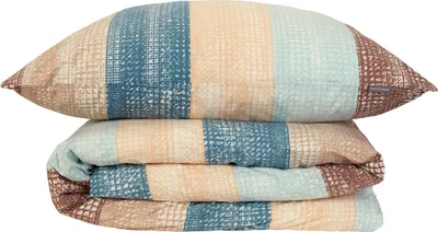A folded duvet and a pillow, both with a striped pattern, are stacked on a white background.