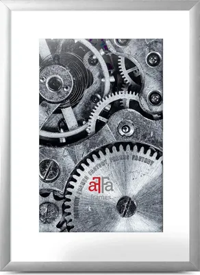 A close-up view of the intricate gears and mechanisms of a watch or clock, framed within a silver picture frame.