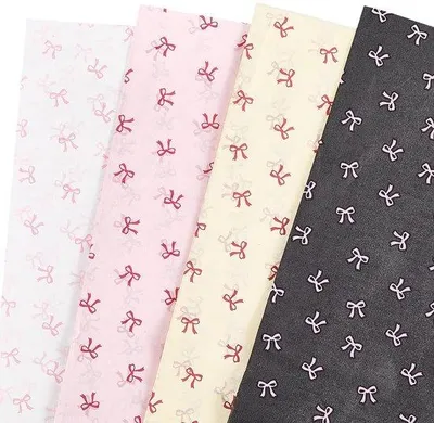 Image de Papier cadeau cartonné, 70 x 50 cm, 20 feuilles en 4 couleurs pour l'emballage