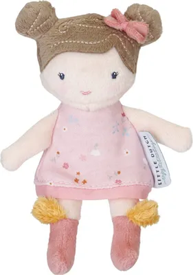 A plush doll with brown hair styled in two buns, wearing a pink floral dress and pink boots with yellow trim.