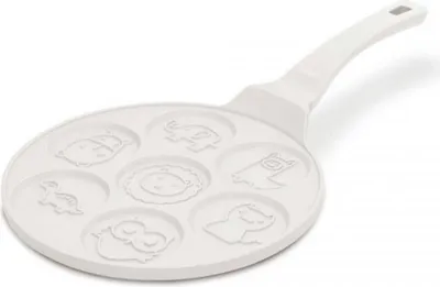 A white pancake pan with animal molds.