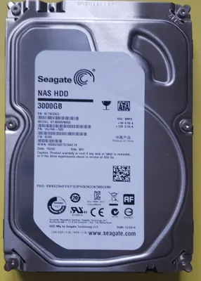 A top-down view of a Seagate NAS HDD 3000GB hard drive.