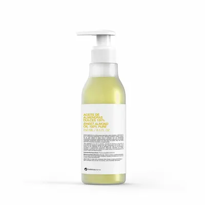 A bottle of sweet almond oil with a pump dispenser, shown against a white background.