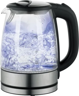 A glass electric kettle with water boiling inside, illuminated by blue light.