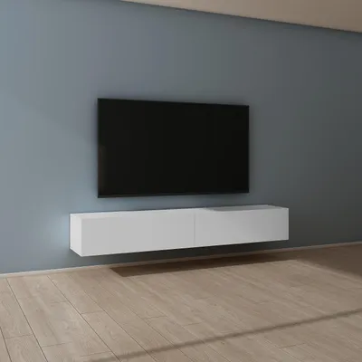 A modern living room with a wall-mounted TV and a white floating media console.