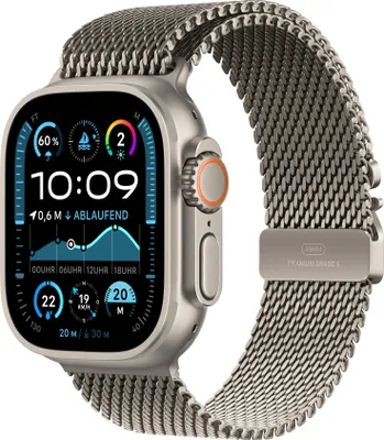 A close-up of an Apple Watch Ultra 2 with a mesh band, displaying various metrics on its screen.