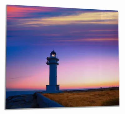 Produktbild von Wallario Herdabdeckplatte aus Glas, Größe 60 x 52 cm 1-teilig, Motiv Leuchtturm am Abend auf den Balearen Malerischer Himmel