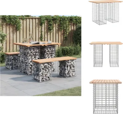 A gabion garden bench and table set on a patio with a wooden fence and greenery in the background.