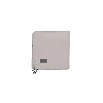 A light gray outdoor chaise lounge cover folded and lying flat against a white background.