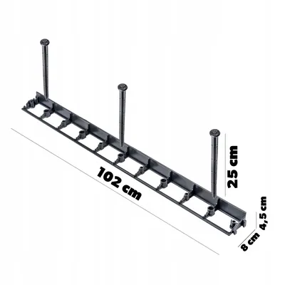 A black plastic garden edging strip with three metal stakes inserted, shown with dimensions indicated by text.