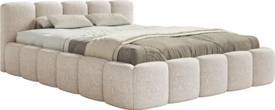A bed with a padded headboard and frame, covered in light beige fabric.