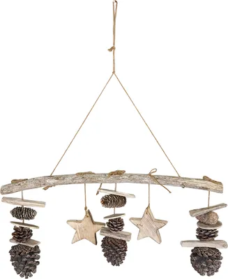 A hanging mobile made of natural materials like driftwood, pinecones, and wooden stars.