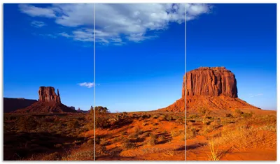 Produktbild von Wallario Herdabdeckplatte aus Glas, Größe 90 x 52 cm 3-teilig, Motiv Monument Valley am Abend I