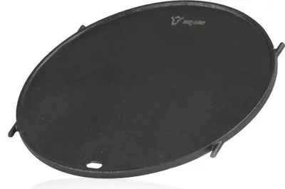 A black cast iron grill plate is shown on a white background.