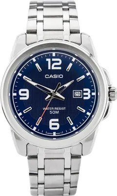 A close-up studio shot of a silver and blue Casio watch.