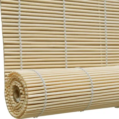 A close-up view of a rolled-up bamboo blind.