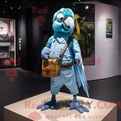 Produktbild von Maskottchencharakter REDBROKOLY eines Cyan-Papageis mit Jeans und Hosenträgern