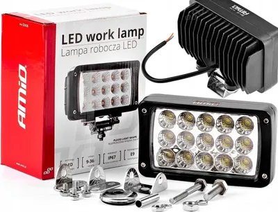 A product shot of an LED work lamp and its packaging, along with mounting hardware.