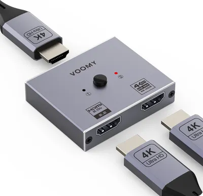 A VOOMY HDMI switch with two HDMI cables connected to it, shown on a white background.