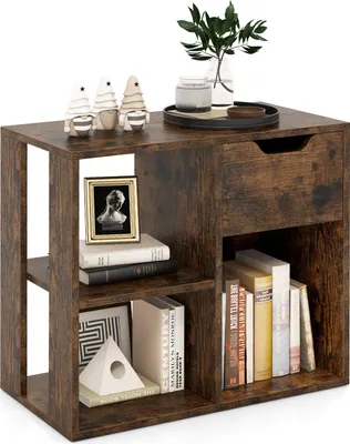 A rustic brown wooden bookshelf with a drawer and multiple compartments, filled with books and decorative items.