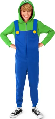 A young boy wearing a Luigi-themed onesie.