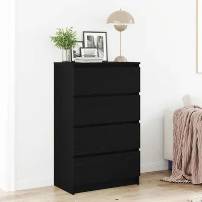 A black dresser with four drawers in a room setting.