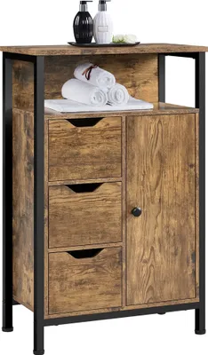 A bathroom cabinet with drawers and a door, topped with towels and dispensers.