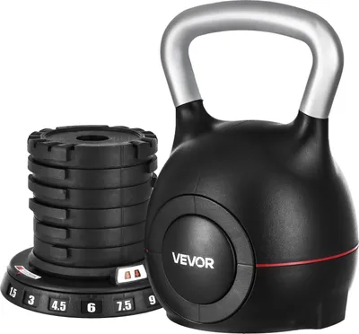 A black adjustable kettlebell with a silver handle and a stack of weight plates next to it, all on a white background.