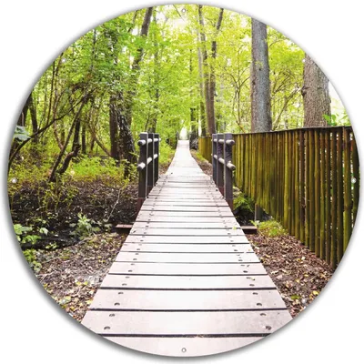 Produktbild von Wallario rundes Outdoor-Poster für Garten oder Balkon, Motiv Spaziergang im Wald  Holzweg über einen Fluss, 60 cm Durchmesser