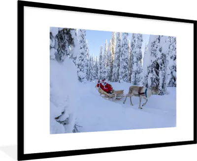 Produktbild von MuchoWow® Gerahmtes Poster Weihnachtsmann auf einem Rentierschlitten 90x60 cm - Poster mit Schwarzem Bilderrahmen Wandposter Rahmen Foto Bilder - Wanddekoration - Fotos