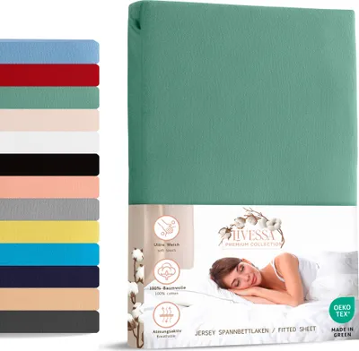 A product image showing a fitted sheet and a woman sleeping on a bed.