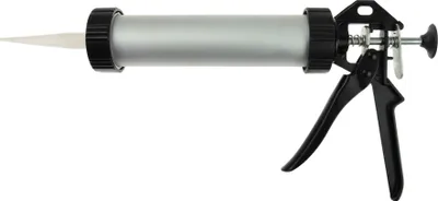 A product shot of a caulking gun on a white background.