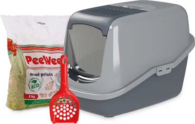A cat litter box, a bag of wood pellets, and a litter scoop are displayed together.