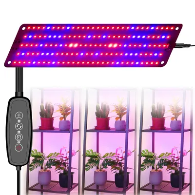 A grow light panel with a controller is shown above three small plant shelves, each containing two potted plants.