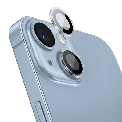 A close-up shot of the rear camera lenses of a light blue smartphone, with two protective lens covers hovering above.