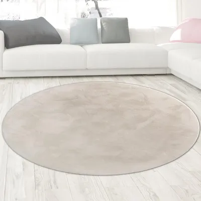 Immagine prodotto di Tappeto in pelliccia di coniglio color crema dall'aspetto elegante e morbido, con raffinati riflessi moderni Dimensioni - 120 cm rotondo