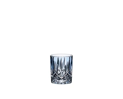 A blue crystal glass tumbler on a white background.