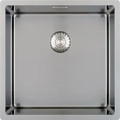 A top-down view of a stainless steel sink with a drain strainer.