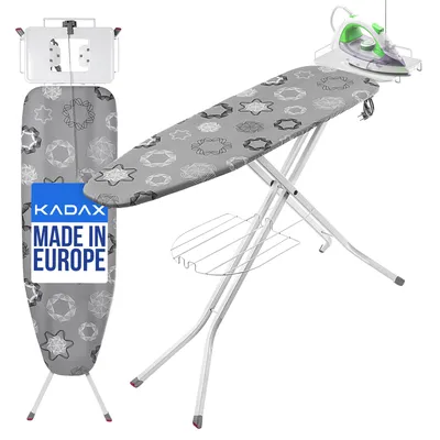 A KADAX ironing board with an iron on it, set against a white background.