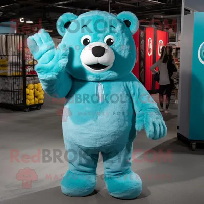Produktbild von Cyan-Bär REDBROKOLY Maskottchen kostüm gekleidet in ein T-Shirt mit V-Ausschnitt und Fäustlinge