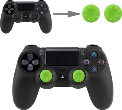 An image showing a black game controller with green thumb grips, with an arrow indicating the application of the grips.