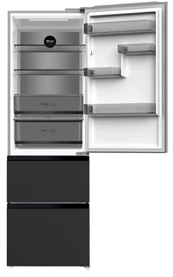 The interior of an open refrigerator with shelves and drawers.